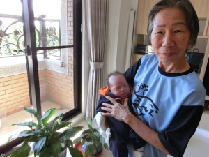 Home at last. Grandma hold Ethan for the first time