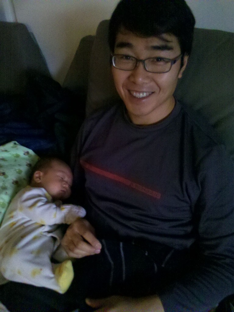 Hanging on to Daddy.