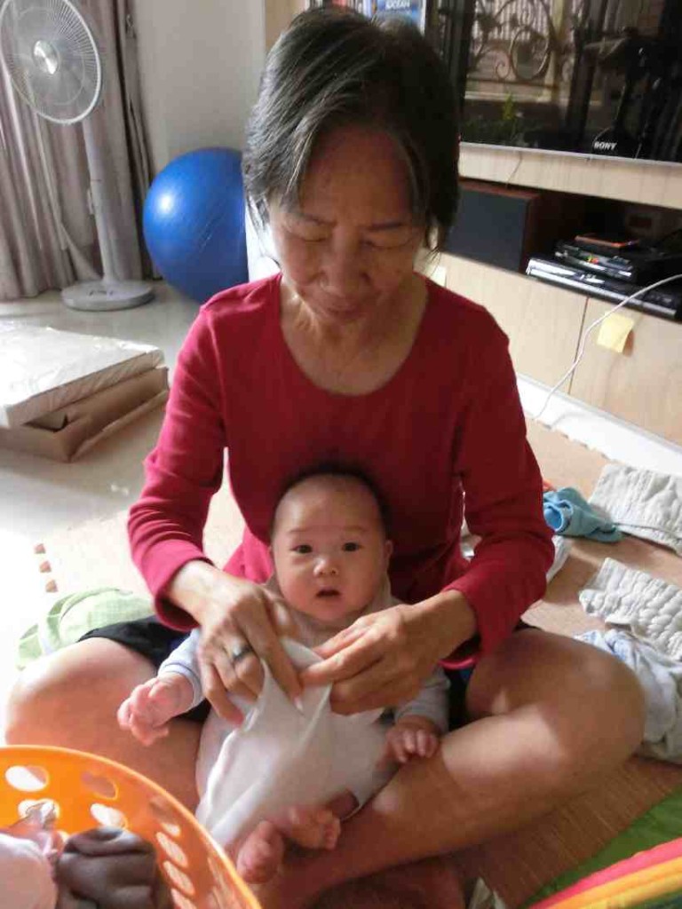 Ethan helping grandma doing laundry. That is so nice.