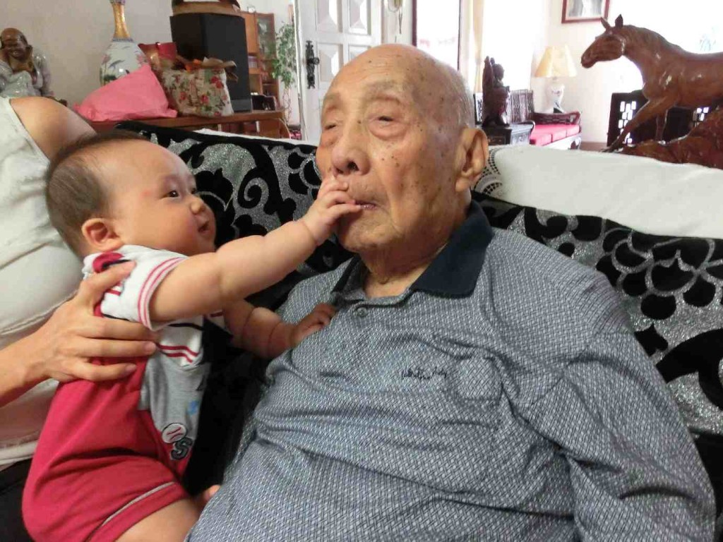 picking at great grandpa's face. Surprisingly, grandpa was not mad or agitated.