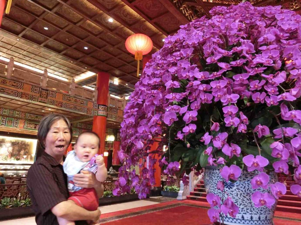 At the Grand Hotel.  Ethan plucked an orchid flower!!!